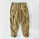 Beige cargo pants on a white background, Obroi