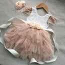 Pink and white dress with floral details on a gray background, Obroi