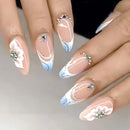 Nails with decorative design on a neutral background, Obroi
