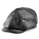 Black leather cap on a white background, Obroi