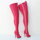 Pink over-the-knee boots with white laces on a light background, Obroi