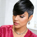 Woman with stylish black haircut wearing a pink top and gold jewelry, Obroi