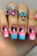 Nails with palm tree design and gradient colors, featuring rings on fingers, Obroi