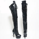 Black knee-high boots with high heel and platform on a white background, featuring ' Obroi' branding.