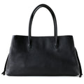Black leather handbag on a white background, Obroi