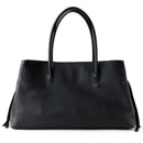 Black leather handbag on a white background, Obroi