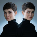 Two identical portraits of a woman with a short haircut and black turtleneck against a gradient background, Obroi