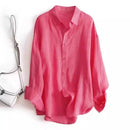 Pink shirt on a white background with a white handbag, Obroi
