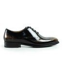Black leather dress shoe on a white background with 'Obroi' branding.