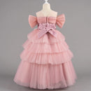 Pink tiered dress with a large bow on a mannequin against a gray background, Obroi