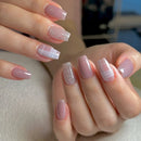 Close-up of hands with pink and glittery nail polish on a neutral background, Obroi