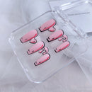 Clear case with pink heart-shaped objects on a white background, Obroi