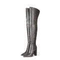Pair of gray knee-high boots on a white background, Obroi