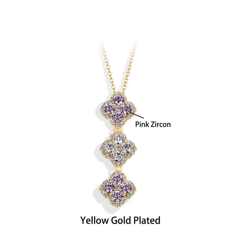 Necklace with pink zircon stones and yellow gold plating on a white background, branded 'Atta Gems'.