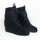 Black wedge ankle boots with laces on a white background, branded 'Obroi'.