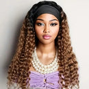 Woman with long, wavy hair wearing a black headband and pearl necklace against a plain background, Obroi