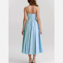 Light blue strapless dress on a plain background, Obroi