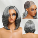 Three-panel product view of a short gray wig on a mannequin against a light neutral background. The left panel shows the front view of the styled wig, the top-right panel shows the lace top and hairline detail, and the bottom-right panel shows the back view of the wig, Obroi