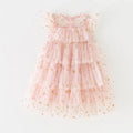 Pink tiered dress with gold star patterns on a white background, Obroi