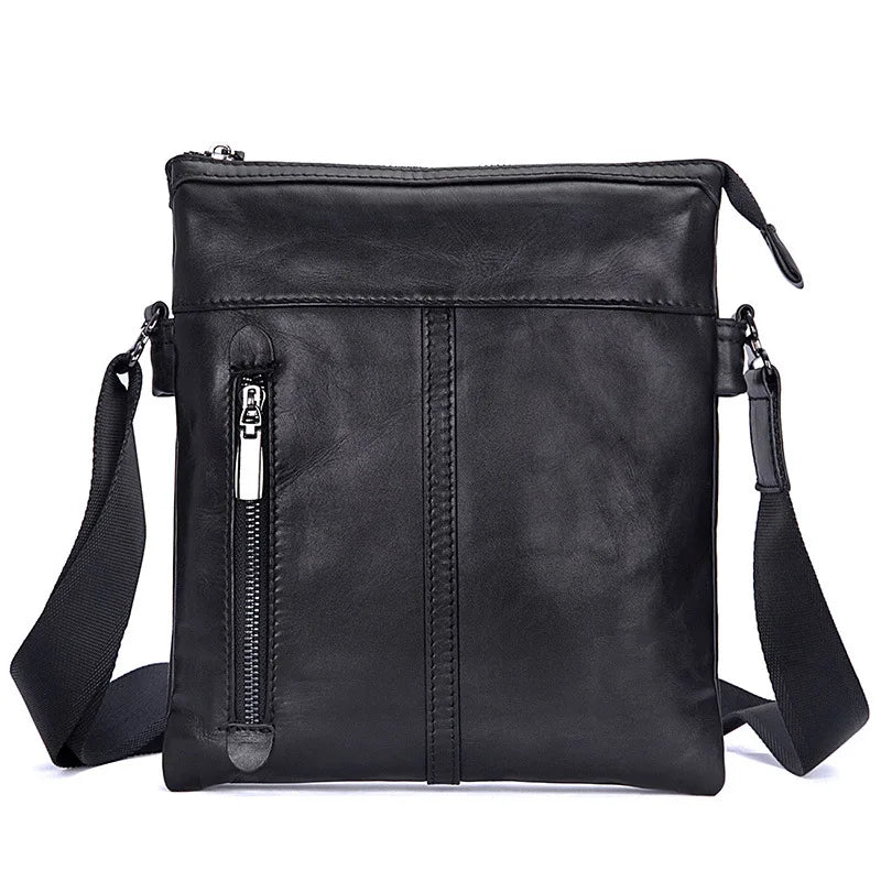 Obroi Black leather crossbody bag with a strap on a white background