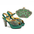 Green high-heeled shoes with detailed embellishments and a matching clutch on a white background, Obroi
