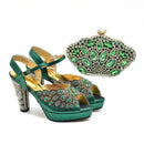 Green high-heeled shoes with detailed embellishments and a matching clutch on a white background, Obroi