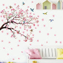 Wall decal of cherry blossom tree with pink flowers and birds on a white wall, Obroi