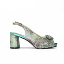 Multicolored patterned sandal with a high heel on a white background, Obroi
