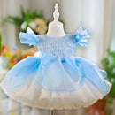 Blue and white children's dress on a mannequin with a blurred background, Obroi