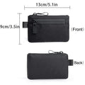 Black zippered pouch with measurements on a white background, Obroi