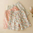 Two floral skirts stacked on a beige background, Obroi