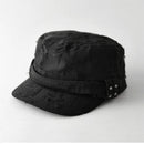 Black distressed cap with metal embellishments on a white background, Obroi