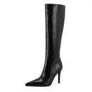 Black knee-high boot with a high heel on a white background, Obroi