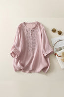 Pink embroidered blouse on a light background, Obroi