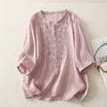 Pink embroidered blouse on a light background, Obroi