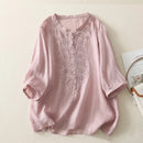 Pink embroidered blouse on a light background, Obroi