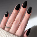 Hand with black nail polish on a neutral background, Obroi