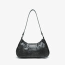 Black handbag on a light gray background, Obroi