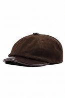 Brown suede cap on a white background, Obroi