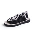 Black and white sandal on a white background