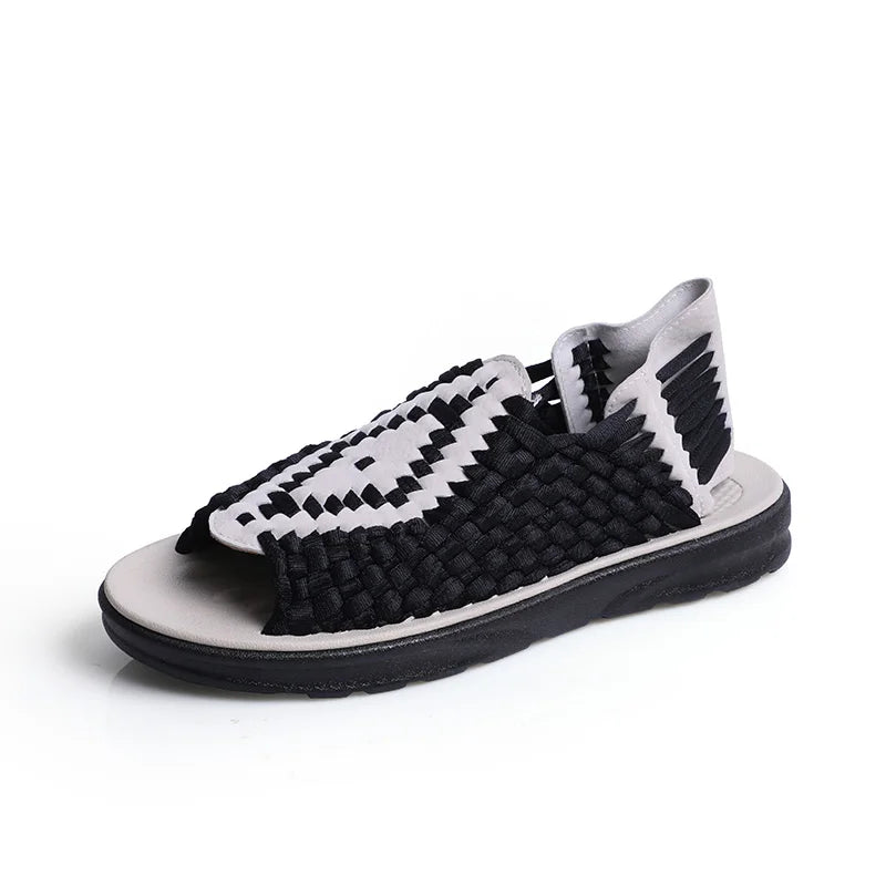 Black and white sandal on a white background