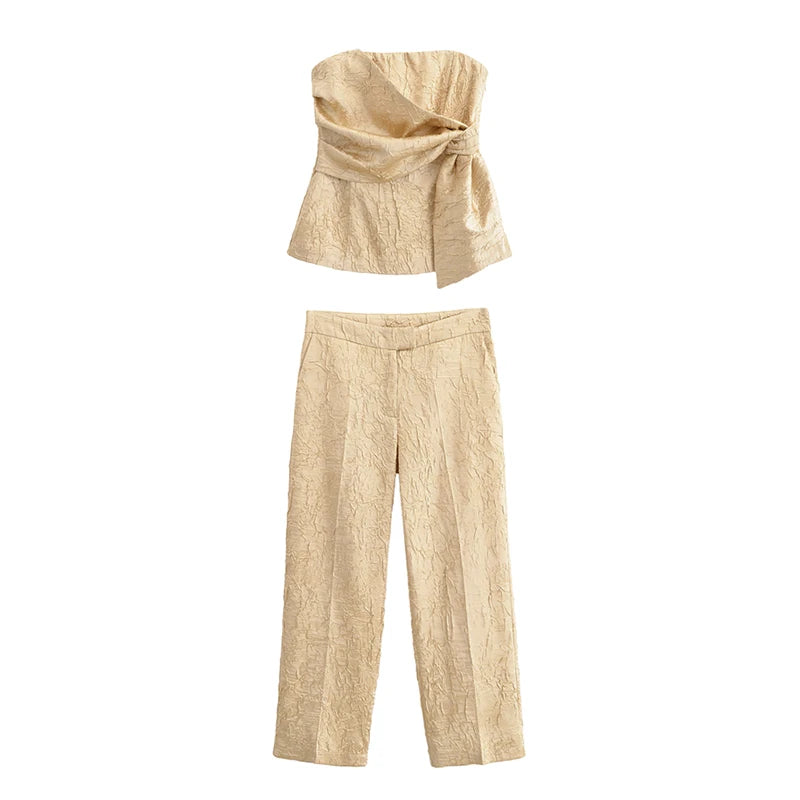 Obroi Beige strapless top and pants set on a white background