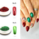 Obroi Nail art display with red and green powder and nail designs.
