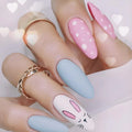Nails with bunny design and pastel colors on a white background, Obroi
