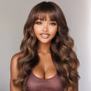 Woman with long, wavy brown hair and a neutral background, Obroi