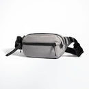 Gray waist bag with black straps on a white background, Obroi