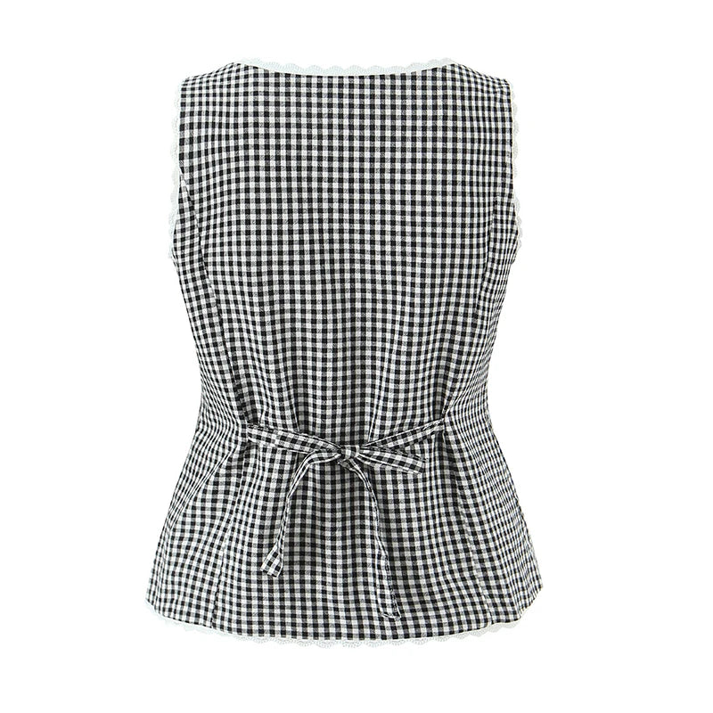 Obroi Black and white checkered top with a belt on a white background