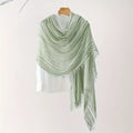 Light green scarf with fringe on a white background, Obroi