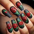 Nails with black and red rose design on a hand, Obroi