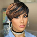 Woman with styled hair wearing hoop earrings and a blue top, Obroi